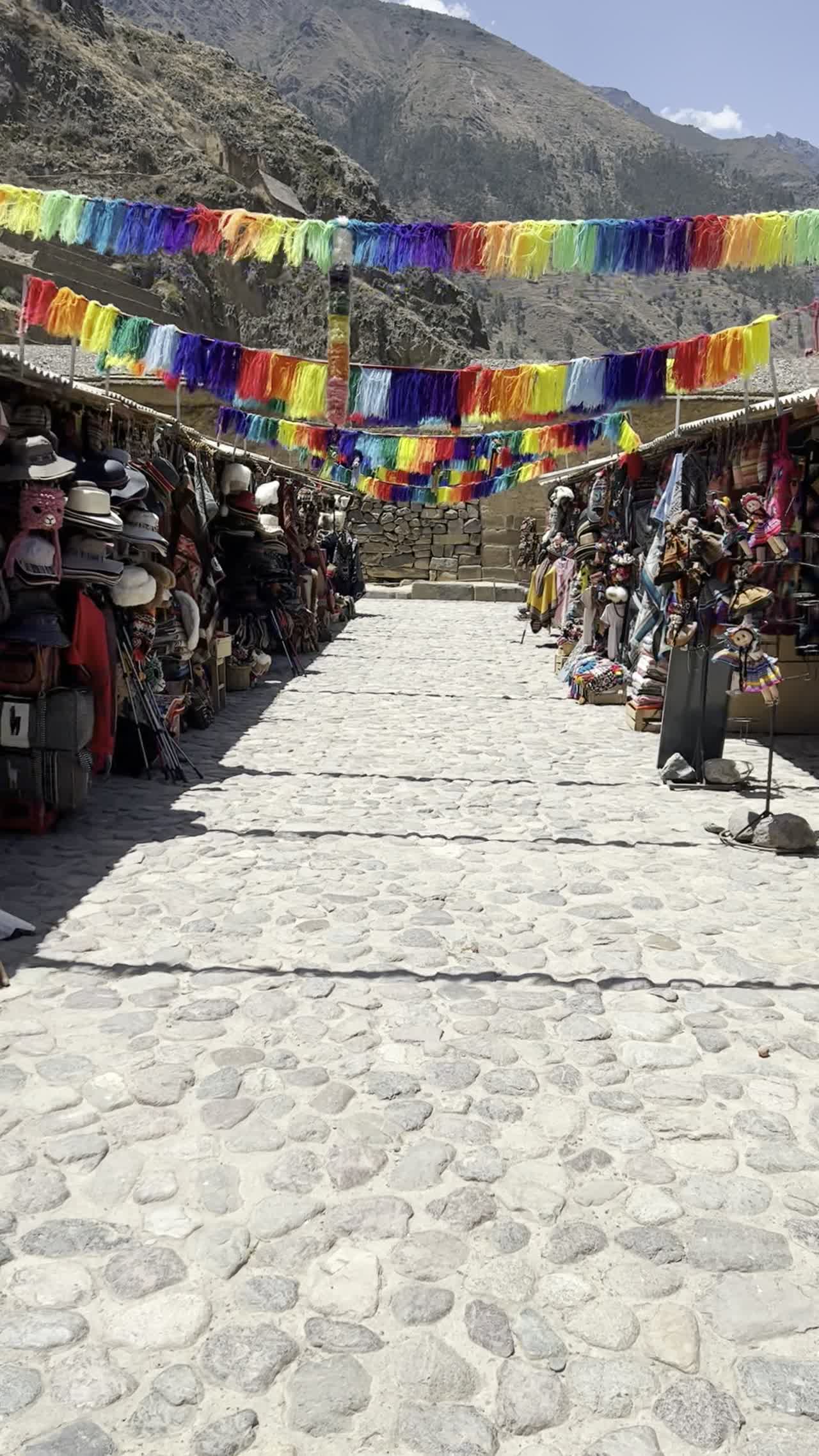Colorful Pisac market stalls in the Sacred Valley